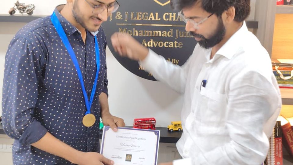 Certificate and medal presented to a participant
